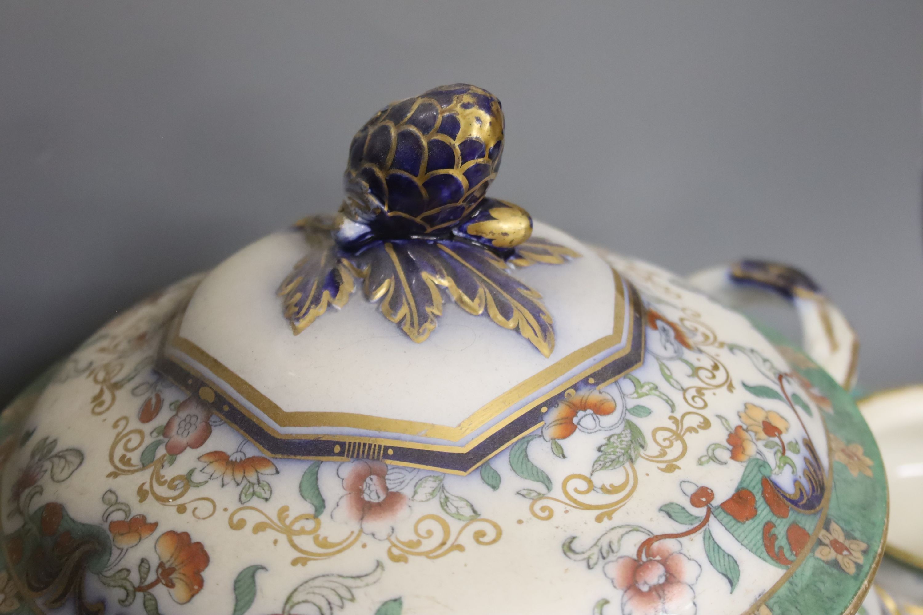 A mid 19th century Staffordshire pottery lidded soup tureen and cover (base cracked), a large meat dish and a sauce tureen (lacking lid) (3)